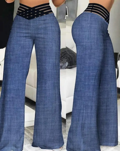 Trousers with crossover strap