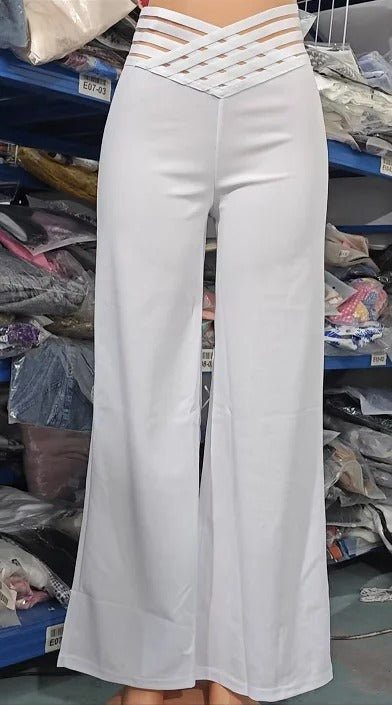 Trousers with crossover strap