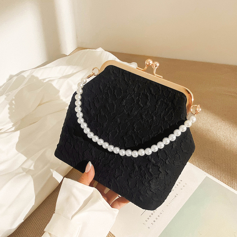 Pochette con perle