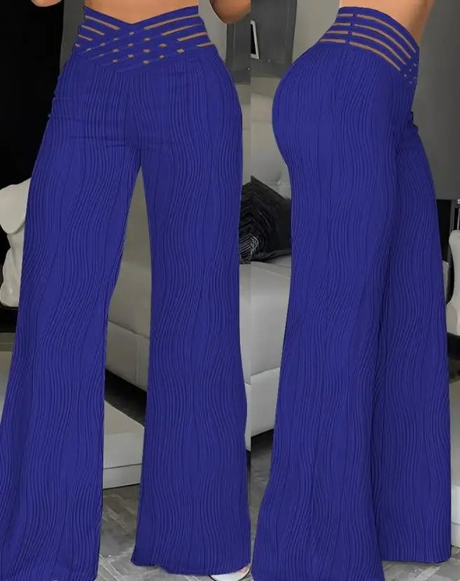 Trousers with crossover strap